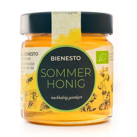 Flüssiger Honig im Glas aus biologischer Imkerei - Sommerhonig / Sommerblütenhonig Bio direkt vom Imker aus Deutschland. 250g Glas von der Bio-Imkerei Bienesto mit schwarzem Deckel.